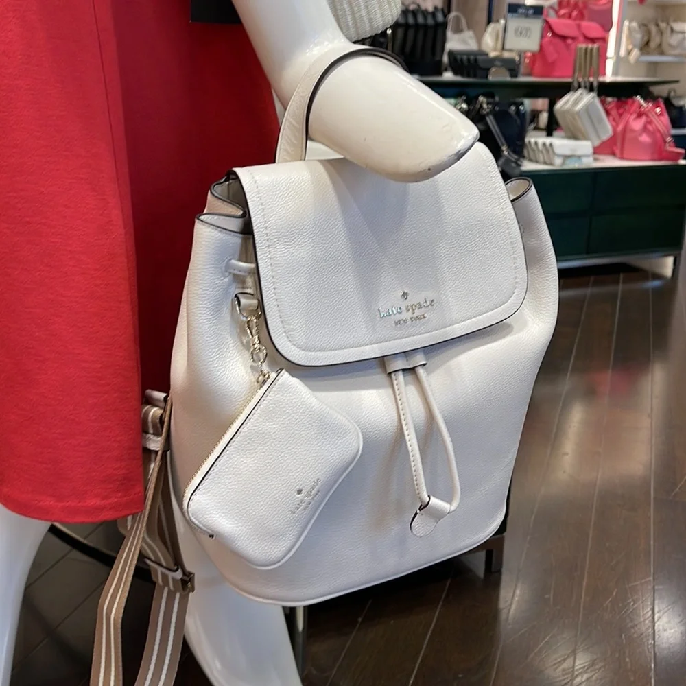 Kate Spade Rosie Medium Flap Backpack 
K8714 pebbled leather Parchment rosie
NWT - Picture 14 of 16